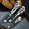 S38d052ee1ec04562b099a8c189fdc1a0H.webp 1pc Non Slip Stainless Steel Food Tongs Meat Salad Bread Clip Barbecue Grill Buffet Clamp Cooking Tools Kitchen Accessories