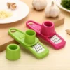 S82ad558fd3e84257981382b449f6e3dek.webp Garlic Peeler Ginger Garlic Press Grinding Grater Planer Slicer Garlic Crusher Chopper Cooking Tool For Kitchen Grater Grinder